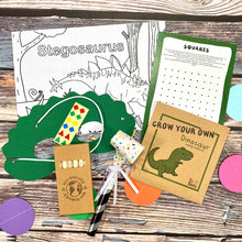 Load image into Gallery viewer, Dinosaur themed plastic free and sustainable kids gift party bag
