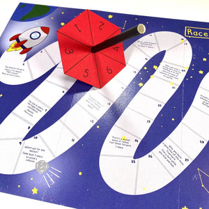 space themed board game with eco friendly alternative dice for children