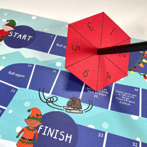 Christmas themed board game with eco friendly alternative dice