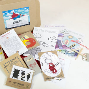 Superhero activity set with eco friendly crafts and games, perfect for a birthday party